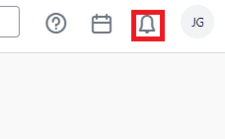 Picture of the upper right hand corner of a Stellic homepage with the bell icon highlighted with a red box.